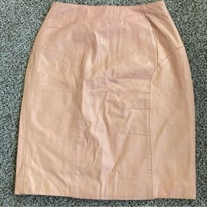 Vintage 80s genuine, leather mini skirt, light pink in color size 9/10